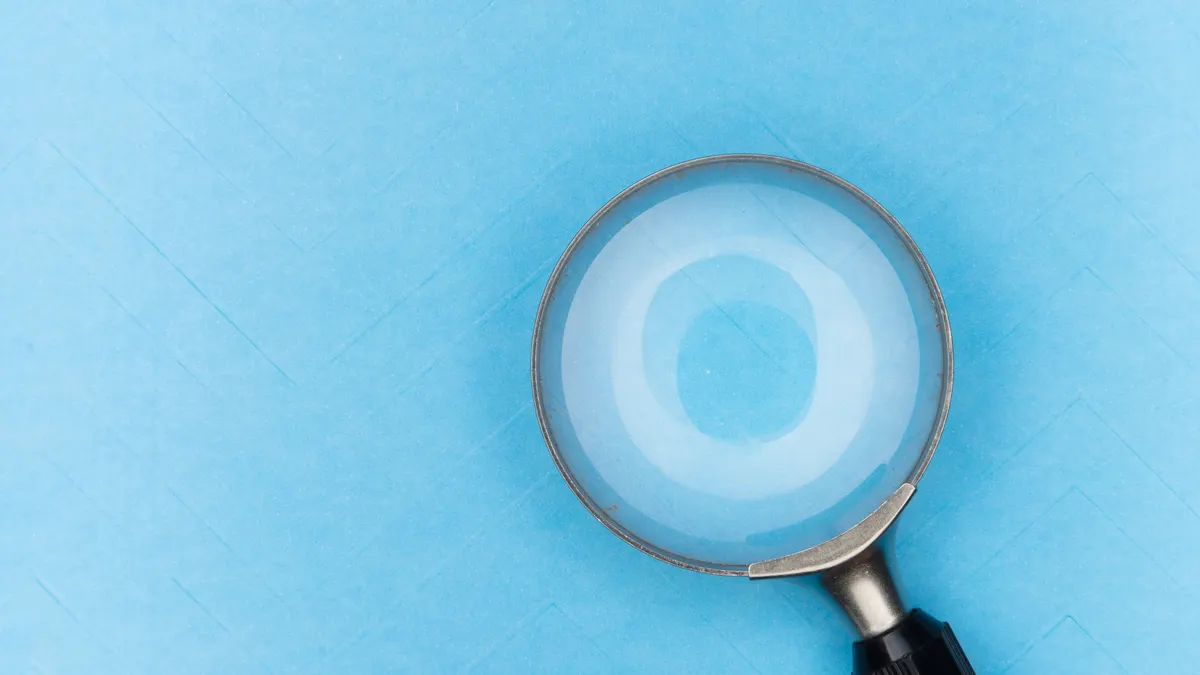 magnifying glass on blue background
